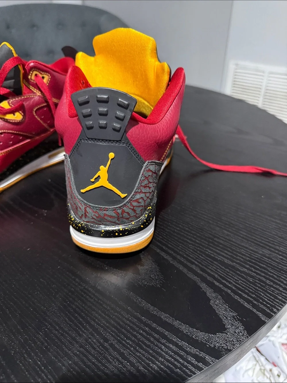 Jordan Men's Red and Black Mid-Top Sneakers with Yellow Accents